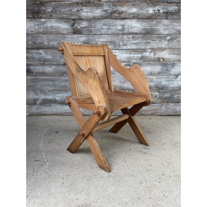 A 19thC Pitch Pine Glastonbury Chair A 19thC Pitch Pine Glastonbury Chair