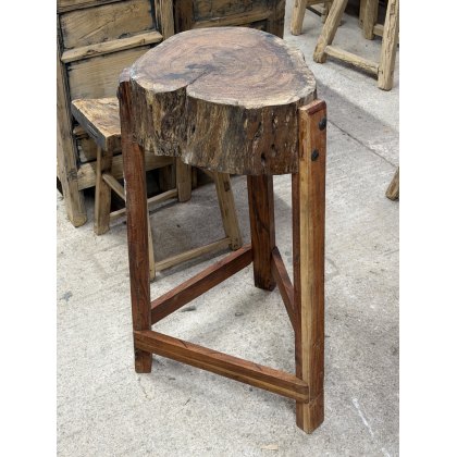 A Rustic Wooden Stump Butchers Block On Stand A Rustic Wooden Stump Butchers Block On Stand