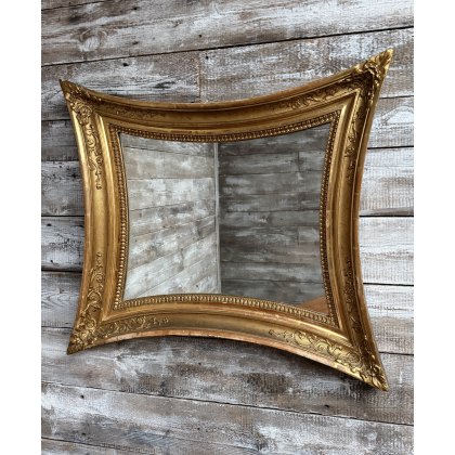A Fabulous "Squashed" Gilded Wall Mirror c1900 A Fabulous "Squashed" Gilded Wall Mirror c1900
