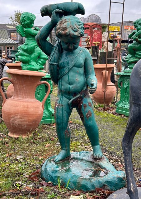 Painted Cast Iron Boy With Large Flower Statue