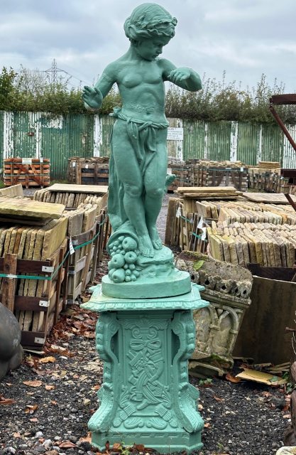 Fabulous Large Painted Cast Iron Boy With Fruit On Plinth Statue