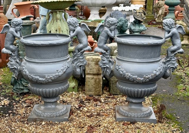 Impressive & Large Rococo Style Cherub Urns