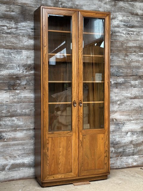 Ercol Elm Glazed Tall & Narrow Bookcase